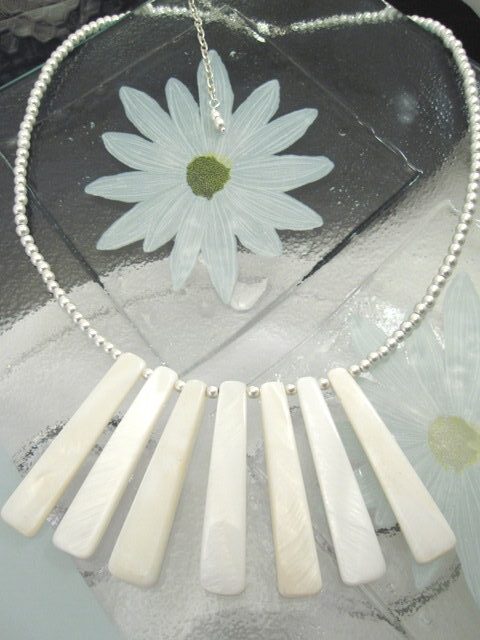 HalsbandParlemorHematitVit