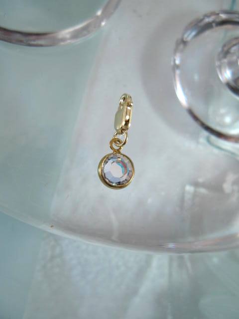 Guldberlock med karbinlås o Swarovskikristall - Vit AB/14K GF