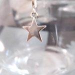 Berlock med karbinlås - Symbol/Stjärna